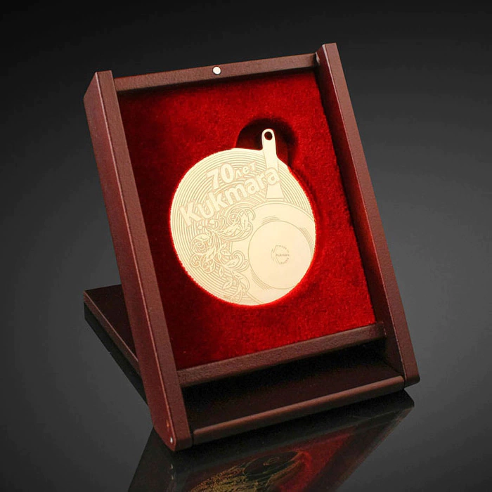 Corporate medal in a transformer stand
